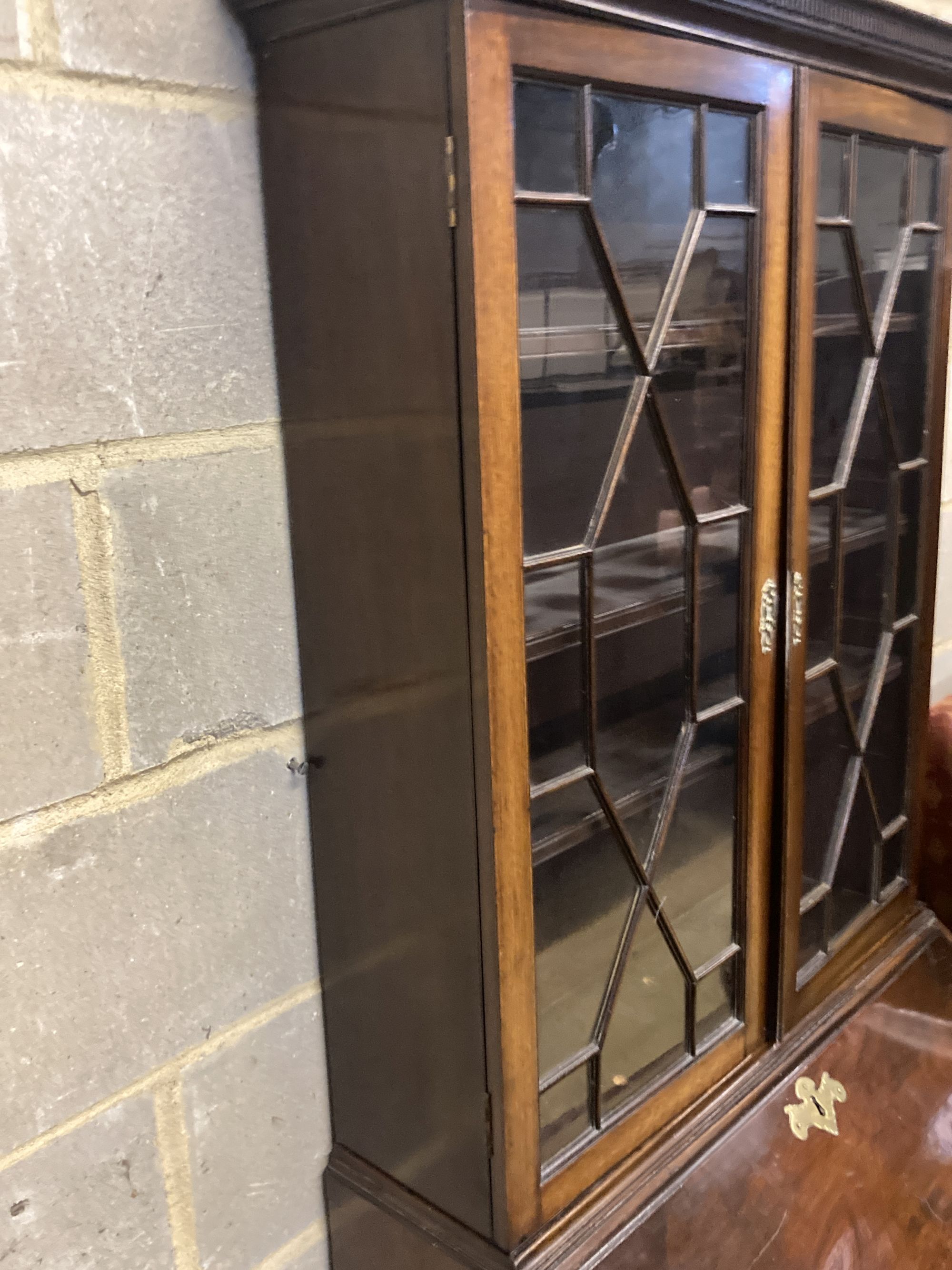 A Georgian style narrow mahogany bureau bookcase, width 76cm depth 44cm height 191cm